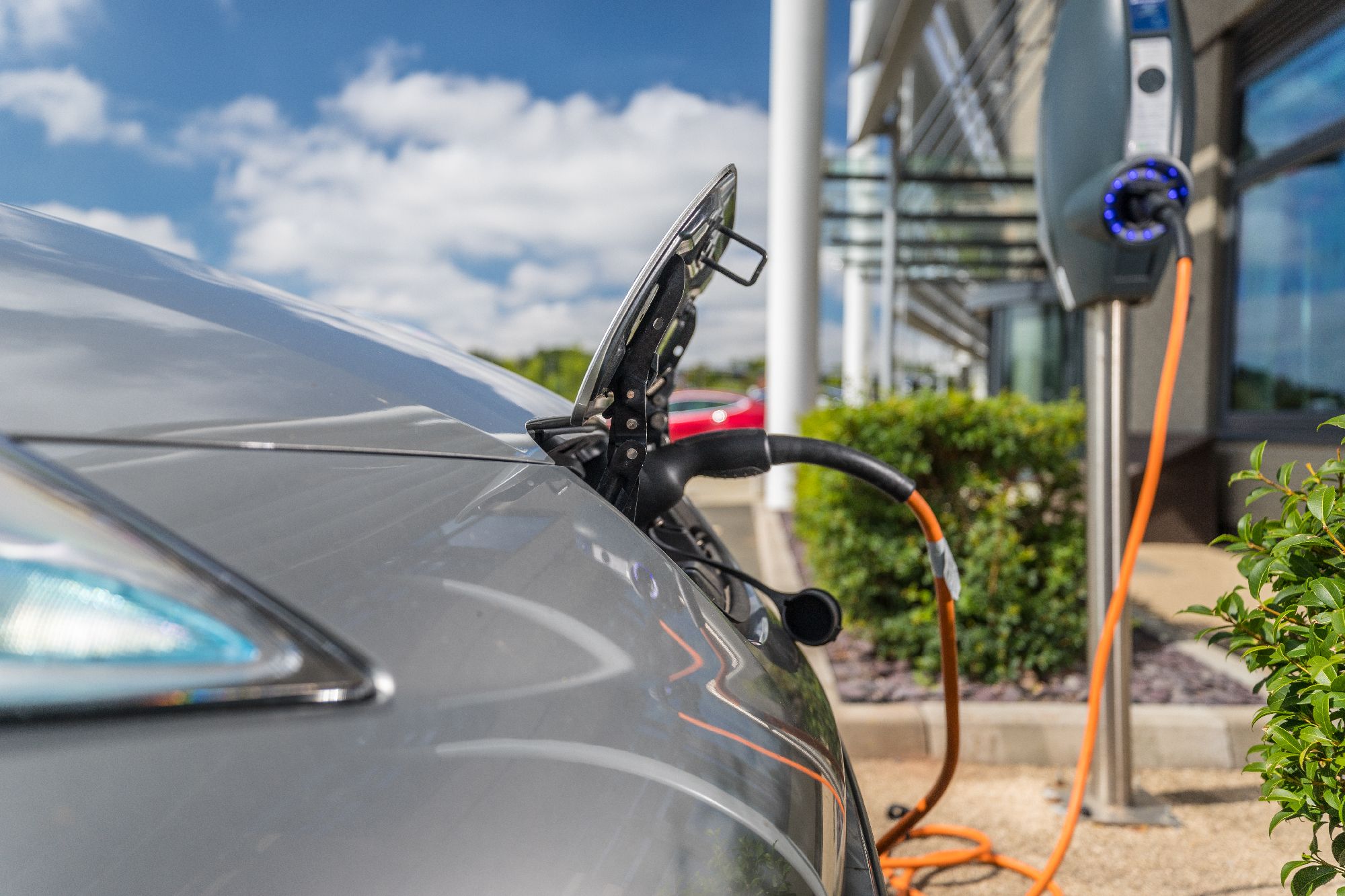 Electric Vehicle being charged outside Oxygen House - Innovation