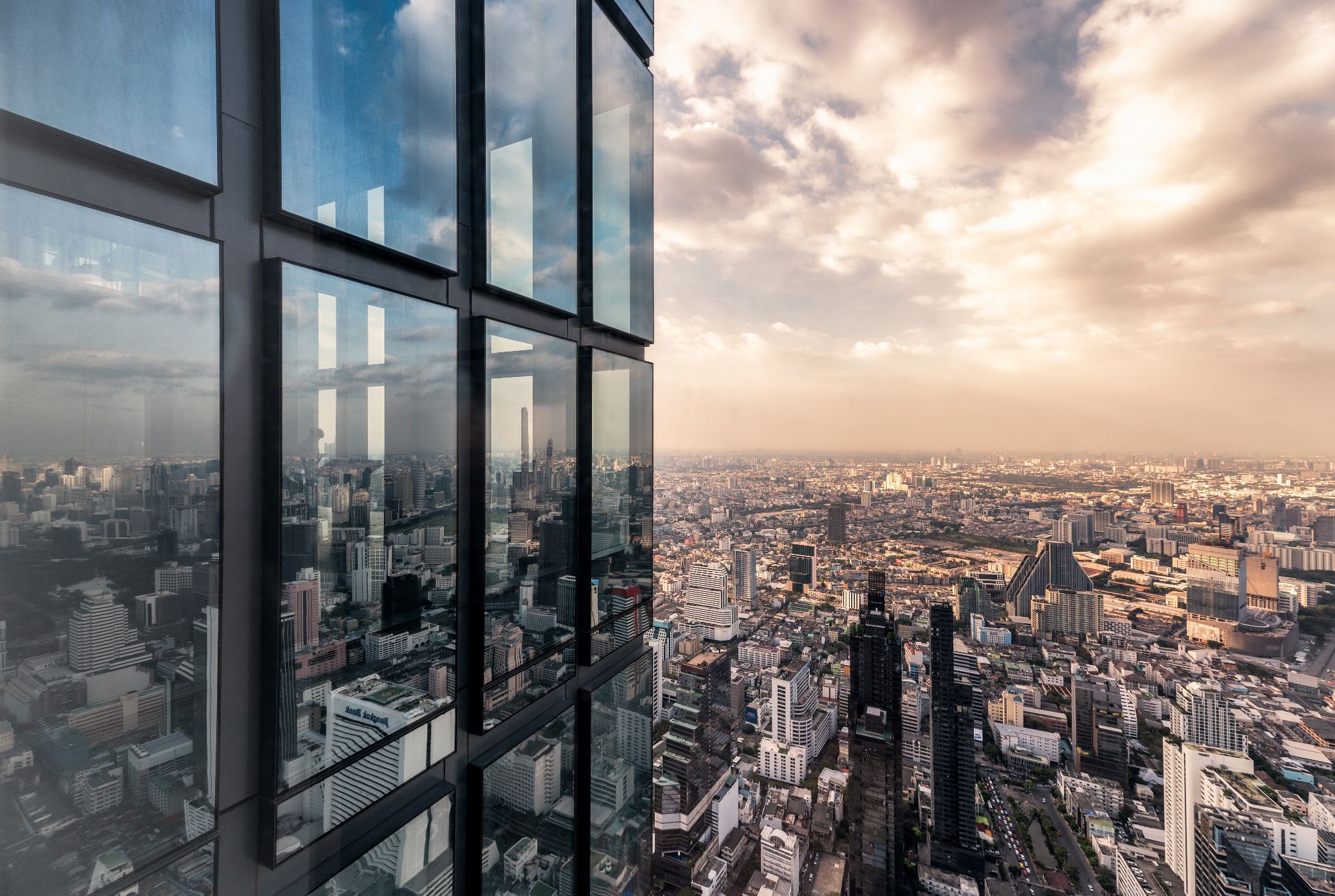 Office front overlooking cityscape with glass windows in Bangkok city - Professional Services