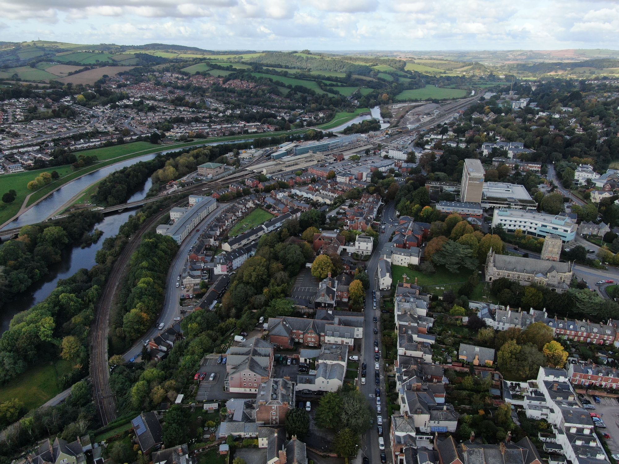An alternative aerial drone shot of St Davids Station in Exeter, Devon, England, UK