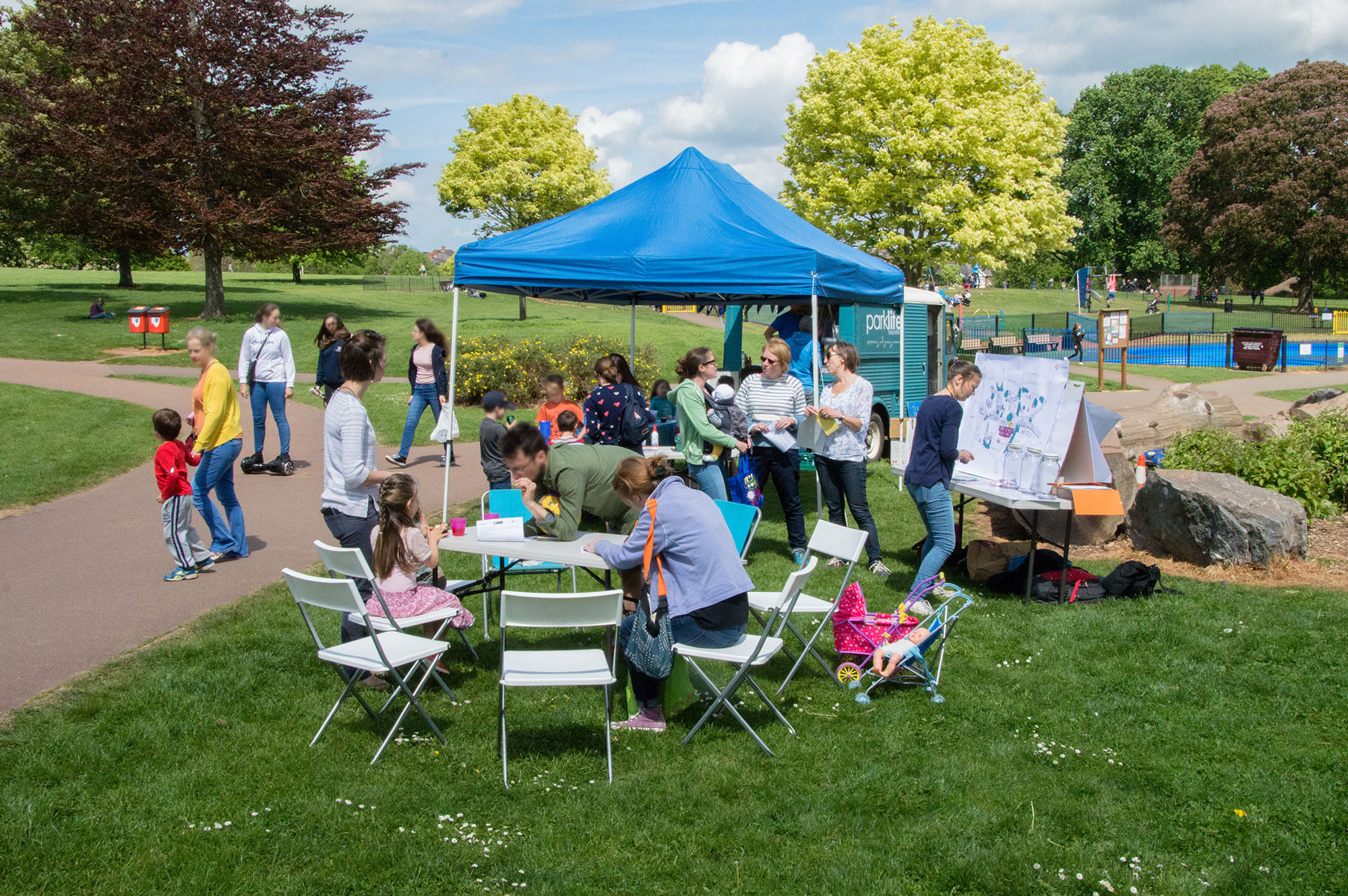 A photgraph of a community engagement event in a Heavitree Park with gazebo