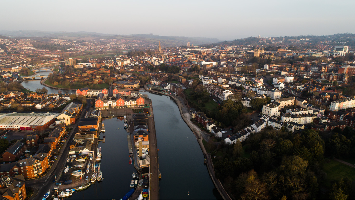 Top-down drone view of Exeter City with Exe Bridges and the Quayside by Devon Drones